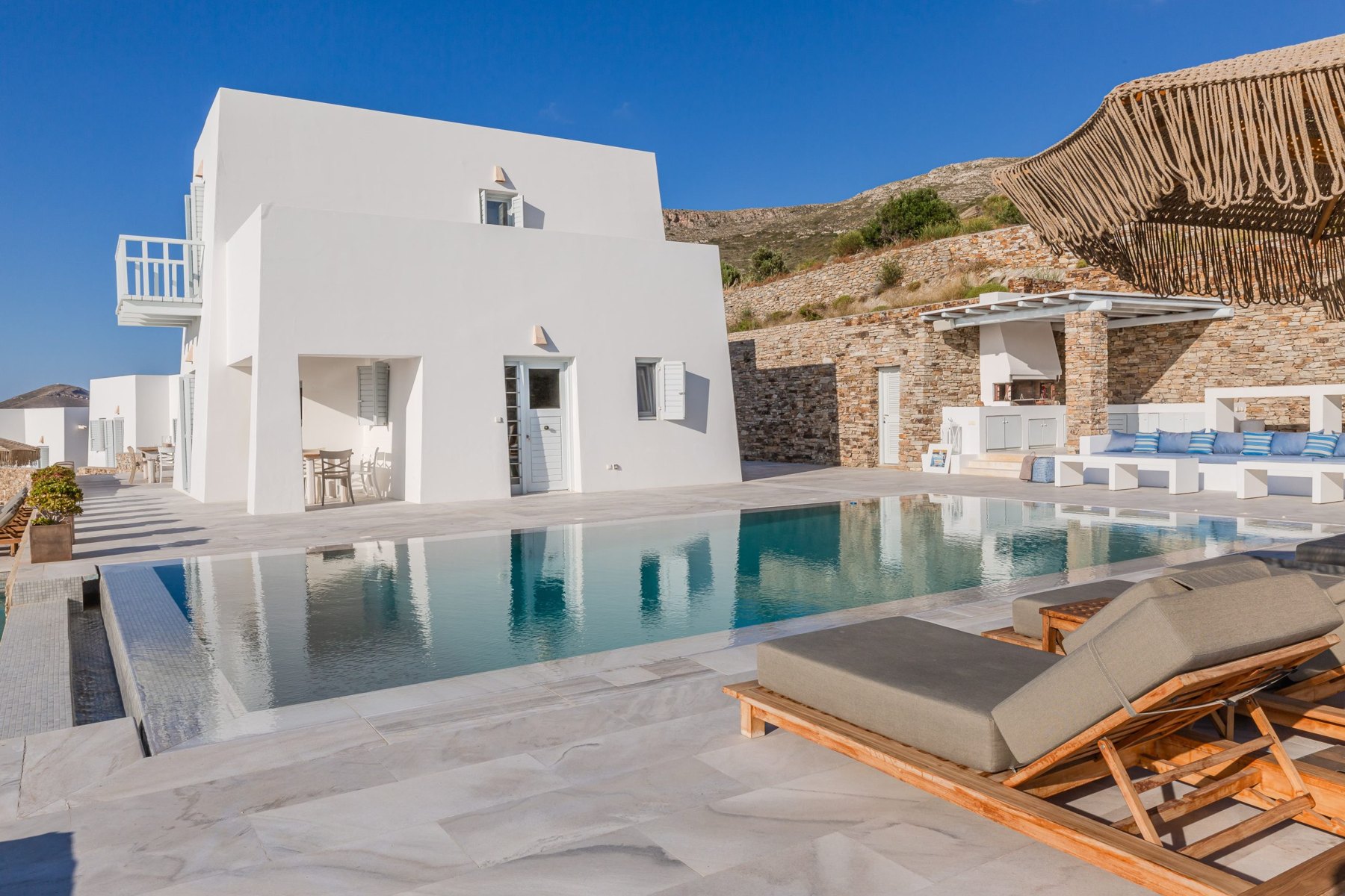 Pool terrace at 6-Bedroom Sea View Villa in Parikia